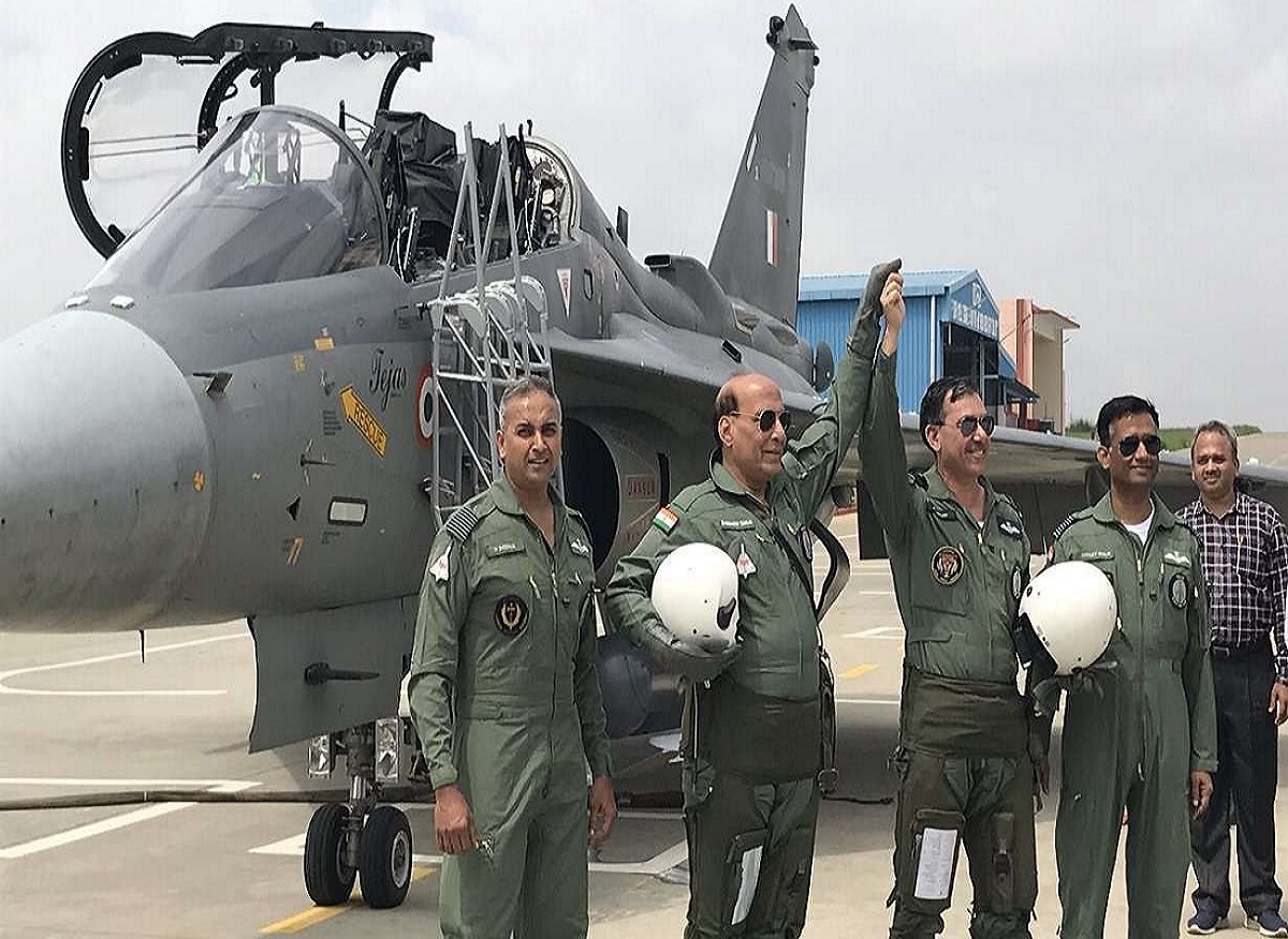 Rajnath singh flying Tejas fighter plan