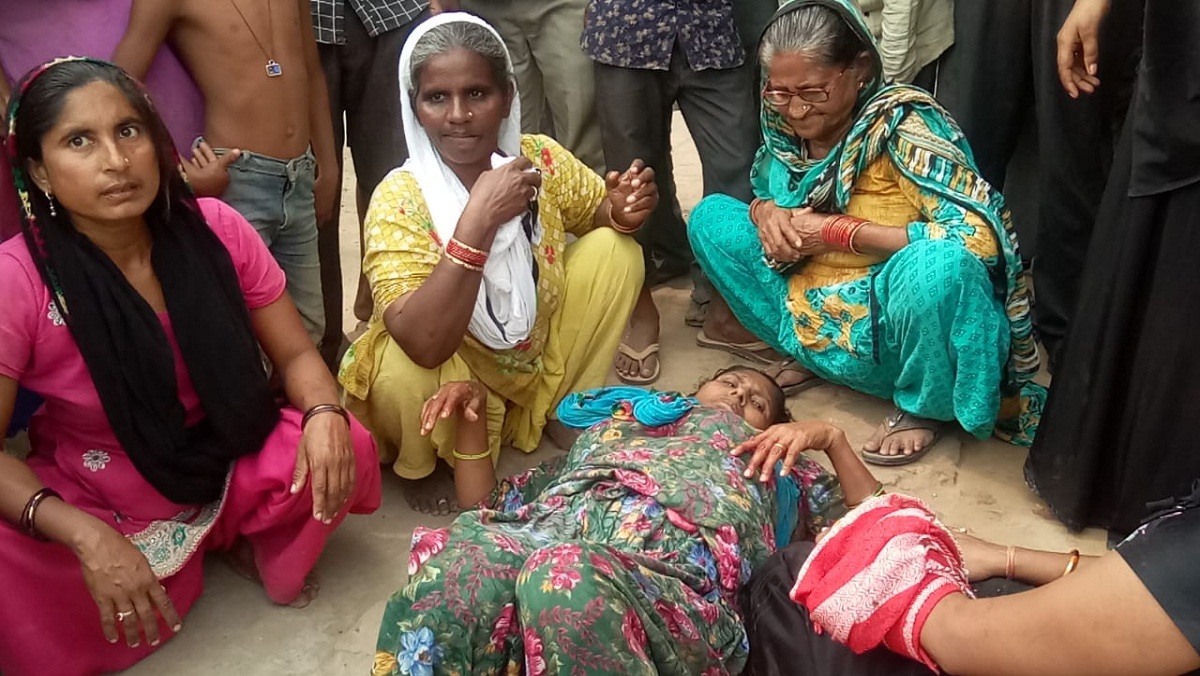 In Fathepur when a man was killed his wife with an ax mob beat him to death