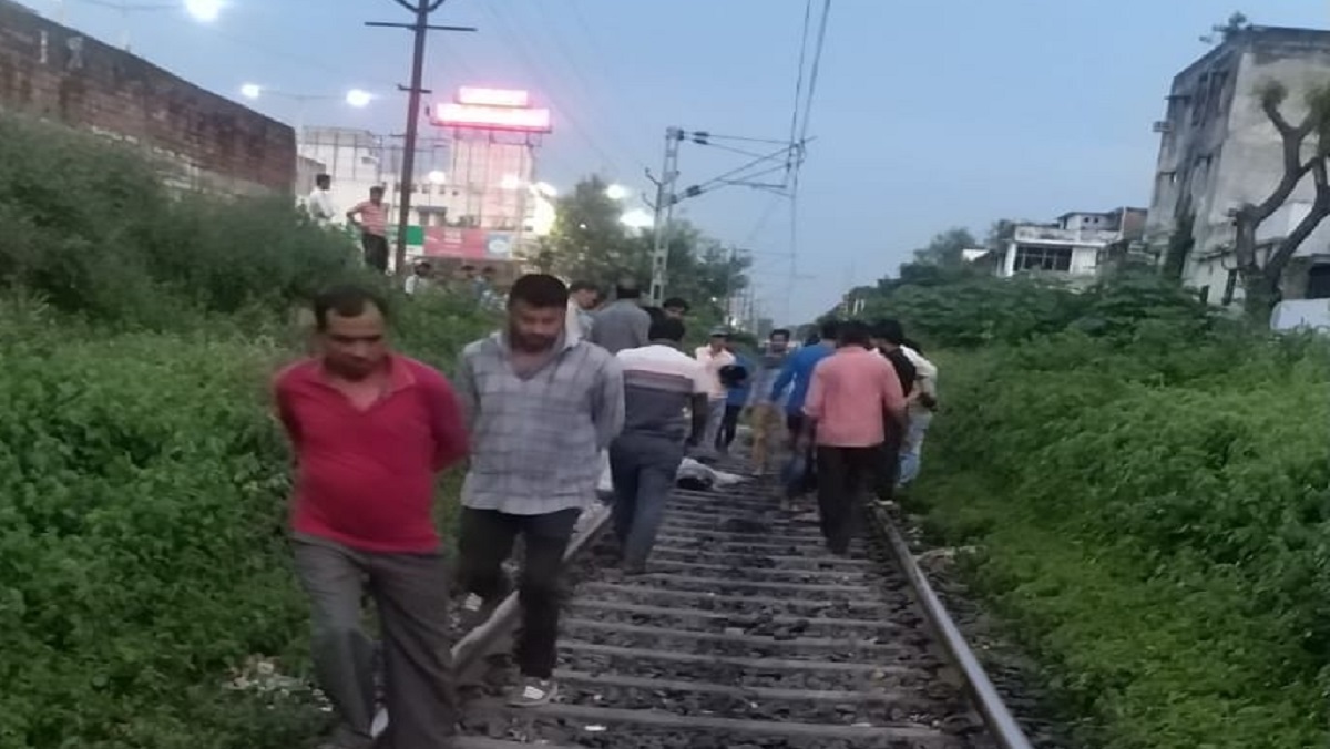 Father and son cut off from train at Coca-Cola intersection in Kanpur