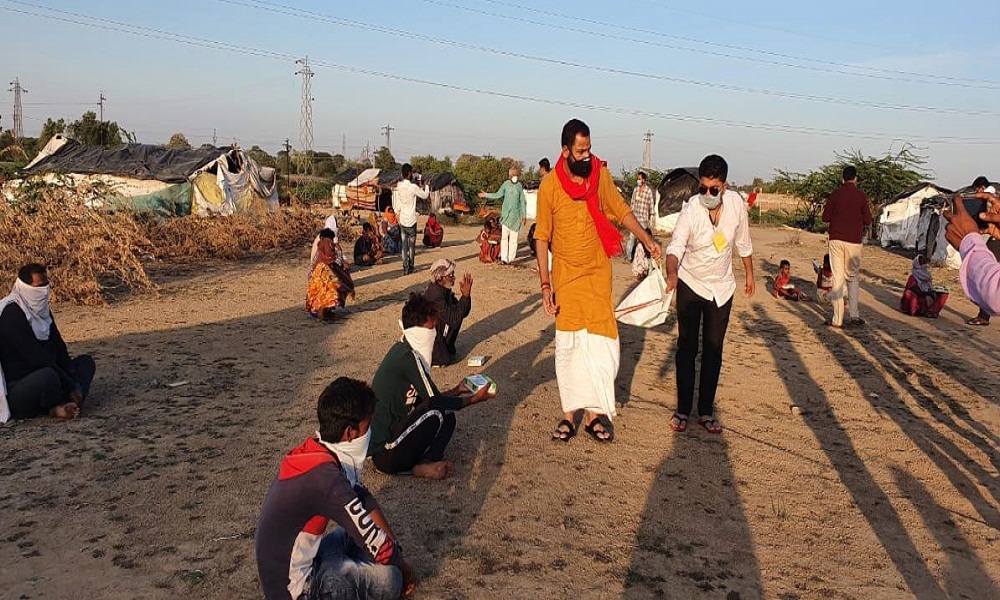 Sadar MLA from Banda Prakash Dwivedi distributed Modi lunch packet to poors