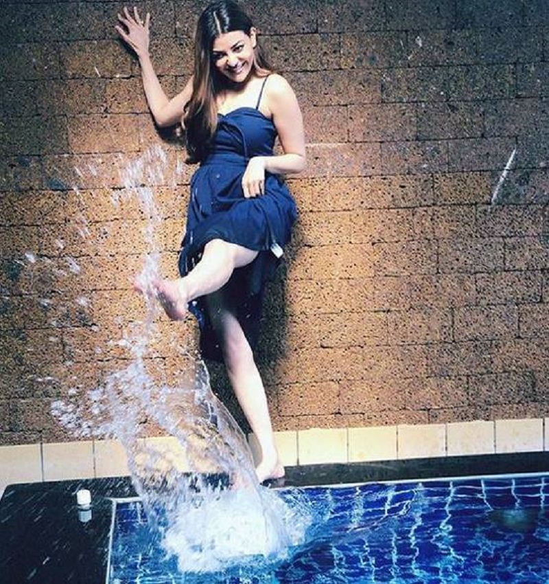 actress kajal agarwal play with water near poll