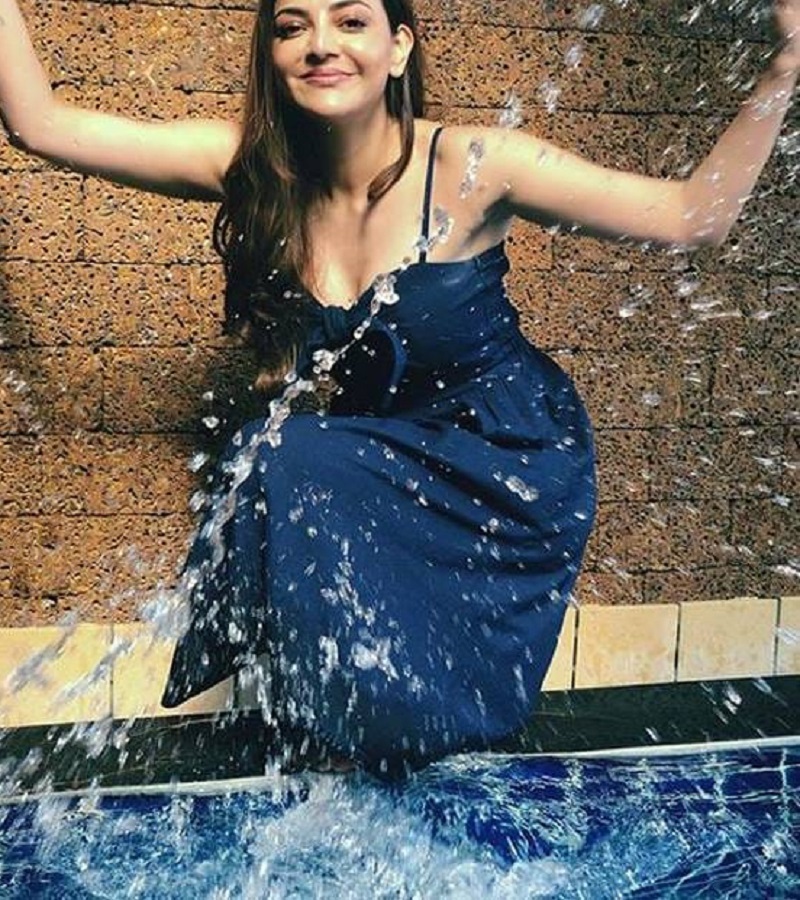actress kajal agarwal play with water near poll