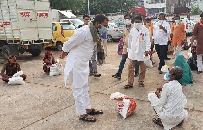 Distribution of ration to poor and needy in Banda