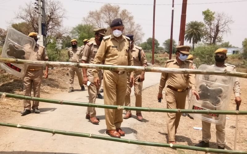 police flag march in girwa village corona positive case